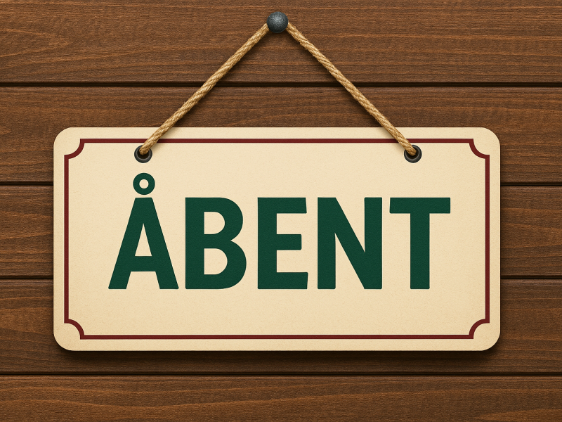 Skilt hvor der står åbent