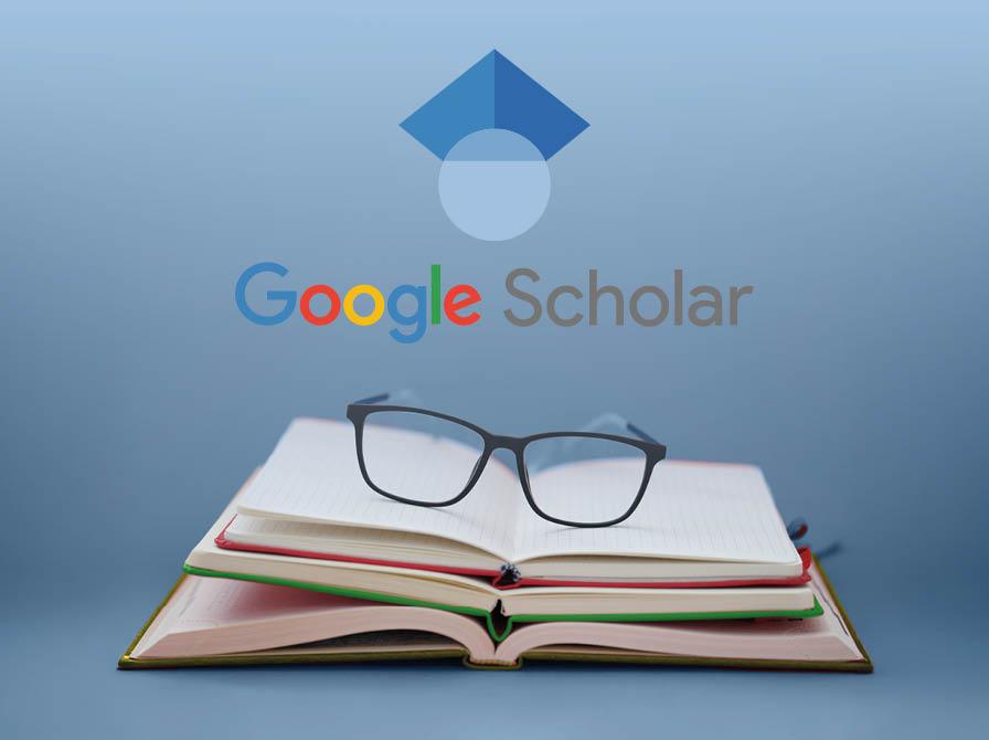 Google Scholar logo med opslået bog og læsebriller